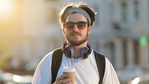 Young Adult Wearing Sunglasses Smiling