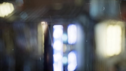 Realistic Rain Streaks on Window with Blurred City Lights