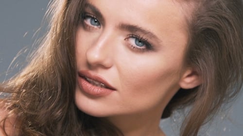 Glamorous Woman Posing With Beautiful Hair and Makeup