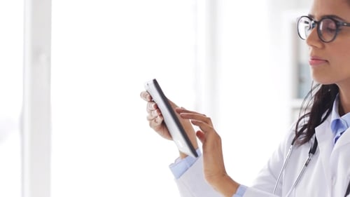Female Doctor with Tablet Pc at Hospital