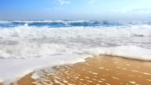 Waves Crashing on Beautiful Sandy Beach