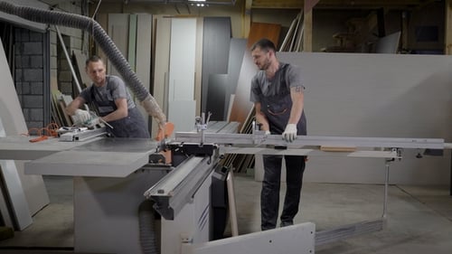 Two Carpenters Are Working in a Joiners Shop in Plant