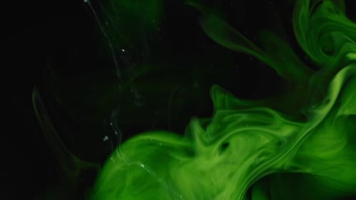 Abstract Background. Green Emerald Paint Mixing in Black Water