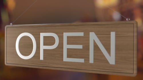Door Sign Is Turned Over From OPEN To CLOSED