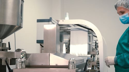 Worker Control Process of Sorting Pills Into Packages