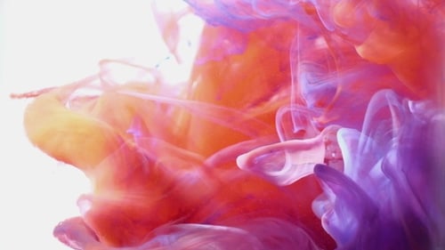 Colorful Ink Plumes Swirling Together