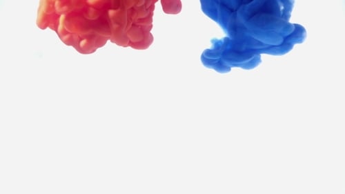 Blue and Red Ink Mixing Together Over a Pure White Background. Fantastic Texture To Place in Your