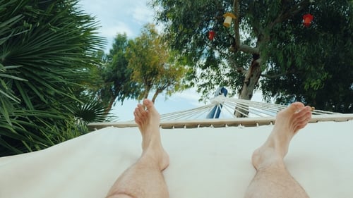 Relaxing in Hammock on Tropical Vacation