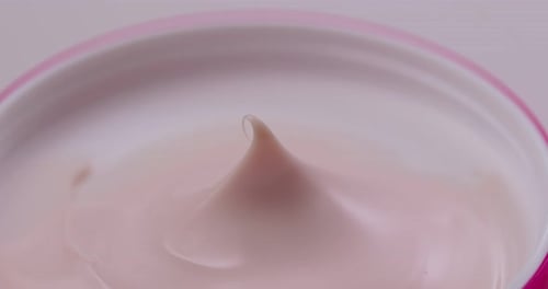 Creamy Pink Cosmetic Beauty Product Close-Up