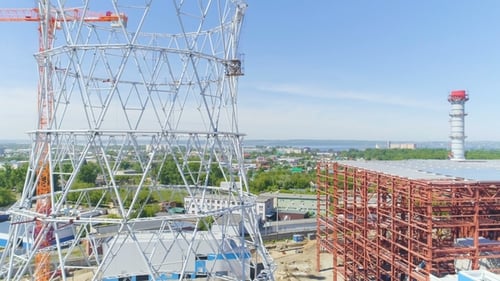 View From Metal Skeletons To Distant City and Sky