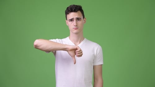Young Adult Gives Thumbs Down on Green Screen