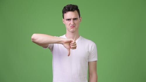 Young Adult Gives Thumbs Down Gesture