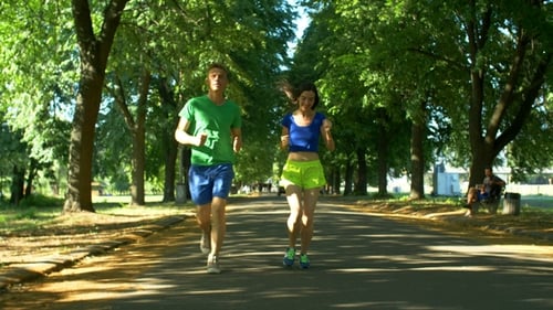 Athletic Attractive Couple Running in Public Park