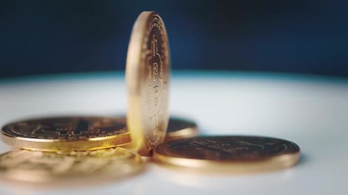 Golden Bitcoin Coin on White Background