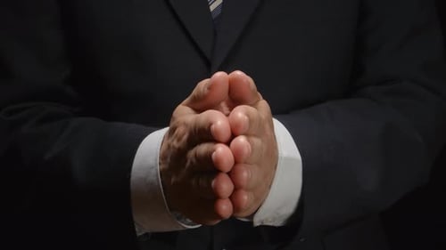 Businessman shows by hands several gestures: balance, choice, decision, solution