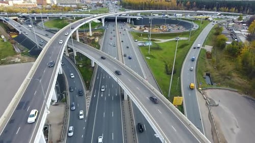 Drone flies over the road urban junction. Highway in Moscow