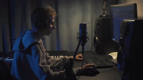 Teenager at Home Composes Music In His Home Sound Studio