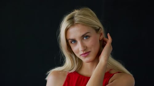 Beautiful Blonde Woman Posing in Studio Close Up