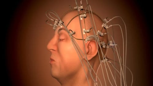 Electroencephalography machine analyzing activity of a human brain. Closeup. HD