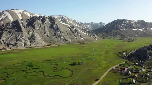 Green Field High in the Mountains of Turkey Filmed on a Drone