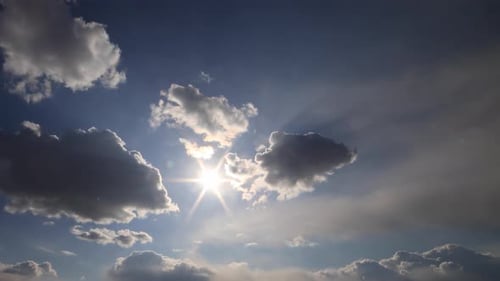 Clouds Parting to Reveal Bright Sunshine