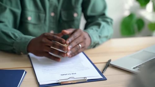 Business Handshake After Reviewing a Resume