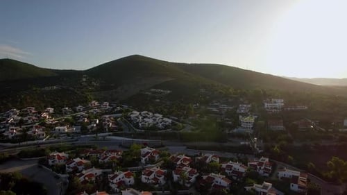 - Aerial View of Neighbourhood at the Bottom of Green Hills, Greece