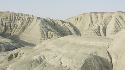 Sandy Mountains and Valley in Desert Landscape