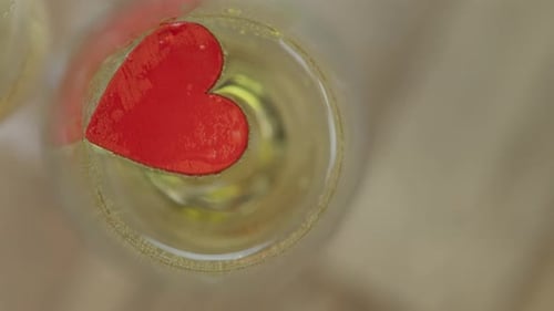 Sparkling Beverage with Red Heart Ornament