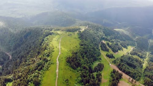 Aerial Drone View: Fabulous View of the Carpathian Mountains in Ukraine. The Mountain Tops Are