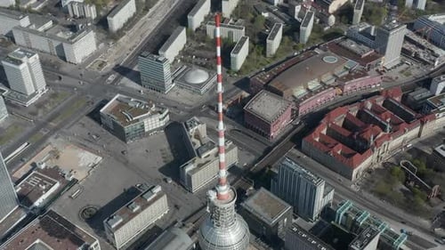 AERIAL: Slow Flight Over Spree River in Berlin, Germany with View on Alexanderplatz TV Tower on