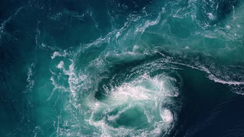 Waves of Water of the River and the Sea Meet Each Other