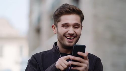 Happy Man Using Phone Outside, Surprised Guy Using Cell Phone Outdoors