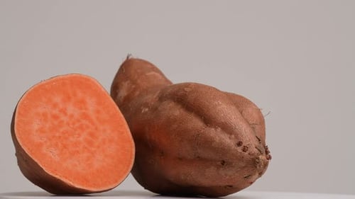 Delicious Sweet Potatoes on a White Surface