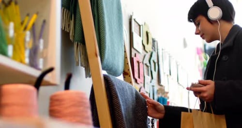 Stylish Young Adult Shopping in Modern Store