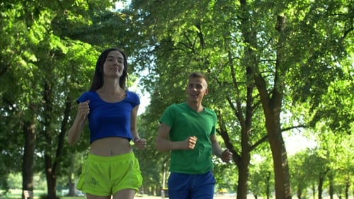 Runner Man Flirting with Woman During Jogging