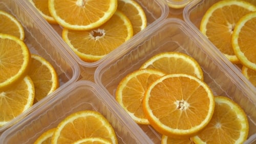 Rotate Fresh Citrus Oranges Fruits. Seamless Loop Spinning Sliced Oranges.