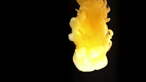 Abstract Yellow Liquid Swirling on Black Background