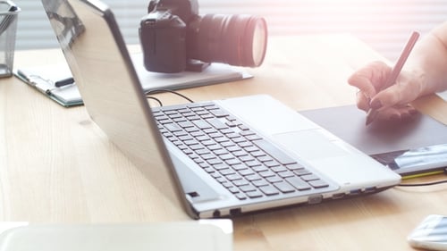 Graphic Designer Aged Woman Using Digital Graphic Tablet