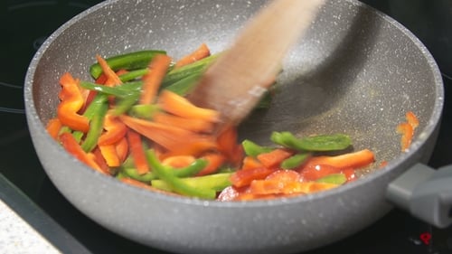 Mixing Fresh Vegetables on Pan