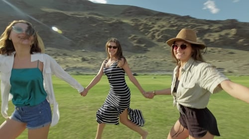 Trendy Hipster Girls Having Fun Outdoor. Three Cute Women Are Whirling on Green Grass. Best Friends.