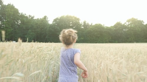 Running Girl Through Field