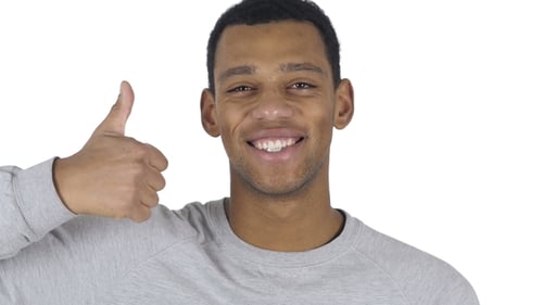 Young Adult Giving Thumbs Up on White Background