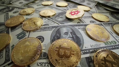 Gold Bit Coin BTC Coins and Dollar Bills.