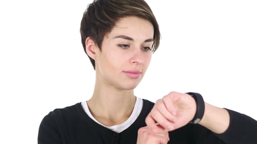 Woman Interacts with Smart Watch Device