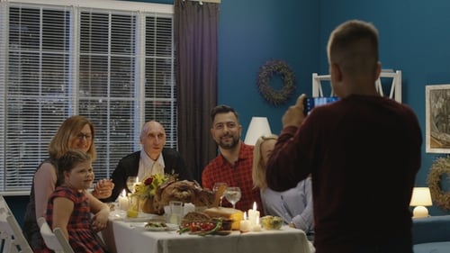 Cheerful Family Taking Photo on Traditional Holiday