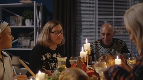 Festive Family Gathering at Christmas Dinner Table