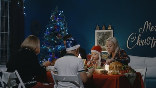 Family Enjoying Christmas Dinner Celebration at Home