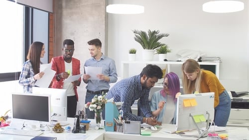 Young People Group in Modern Office Have Discussion of a New Project