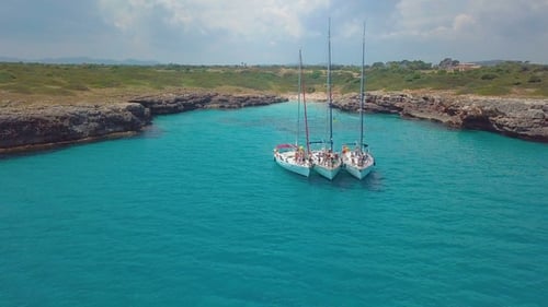 Yacht Sailing on Open Sea at Sunny Day. Sailing Boat in . Sailing Aerial Video